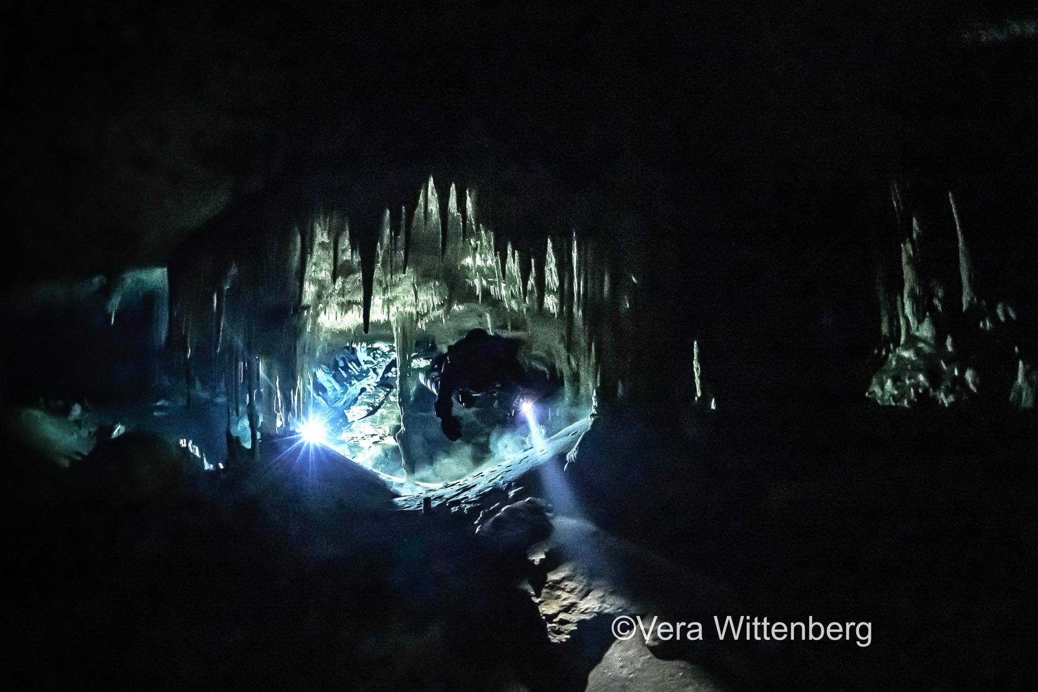 Cave diver in stalactite passage of Sac Actun system